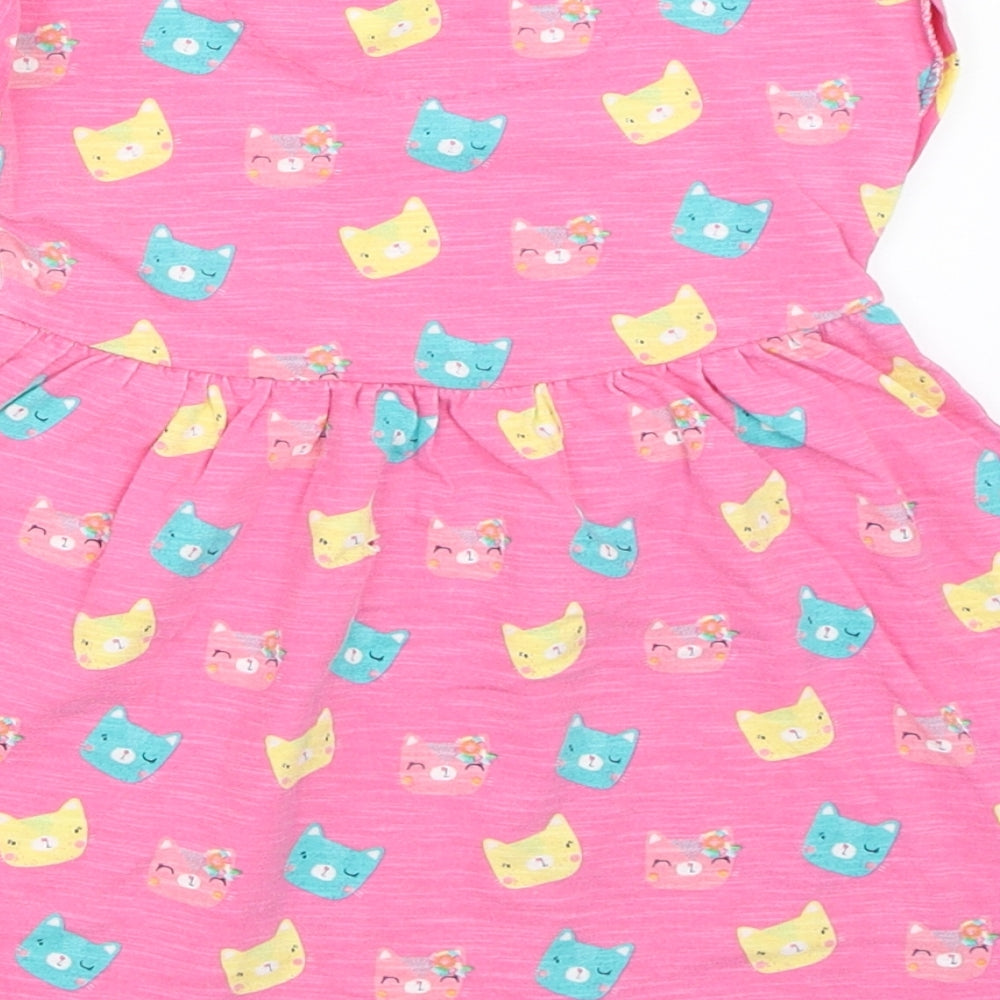 Brand and care label for Mini Club girls’ pink fit & flare, size 9-12, months