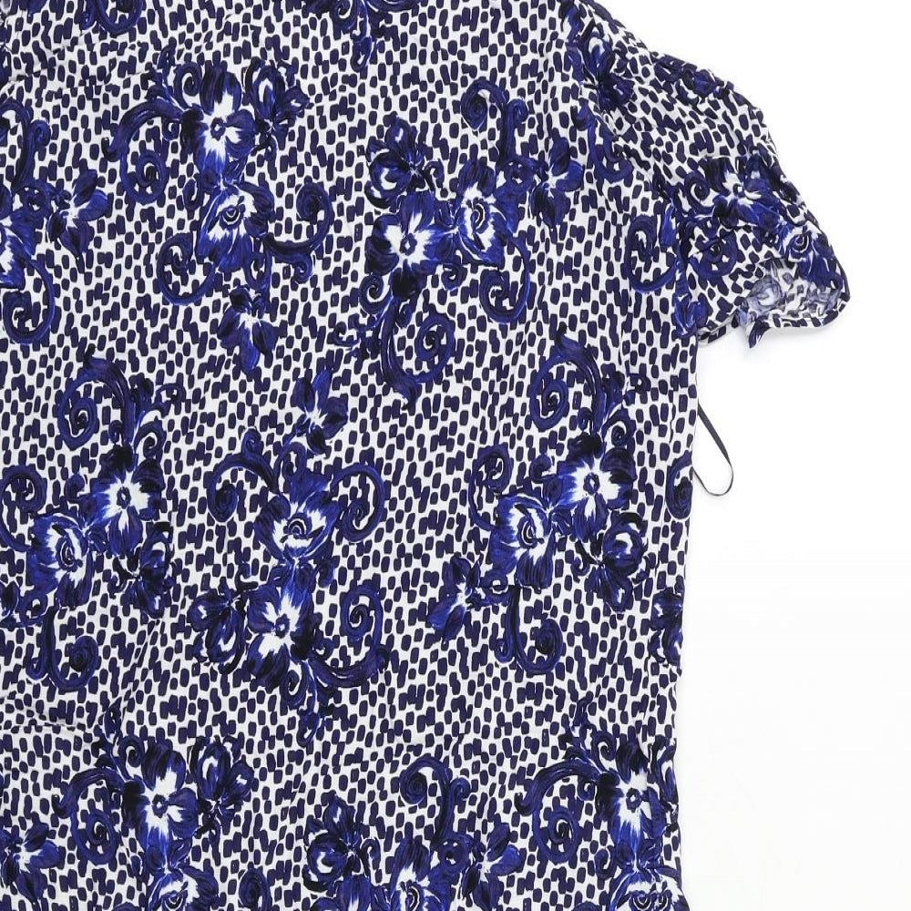 Brand and care label for Papaya women’s blue floral basic blouse, size UK 12