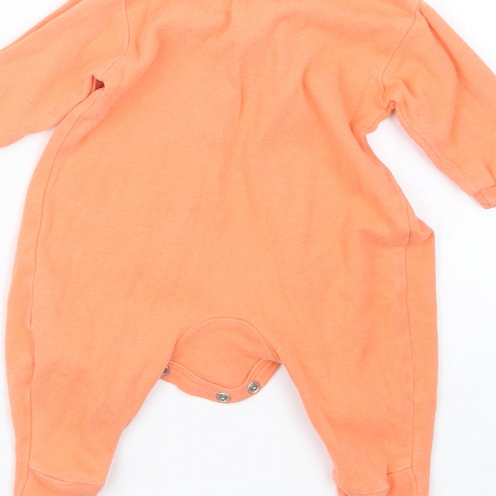 Brand and care label for Early Days girls’ orange babydoll one piece, size 0-3, months