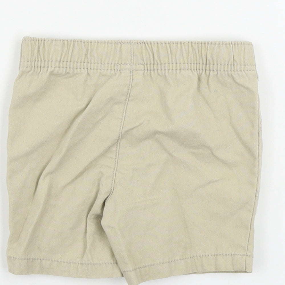 Brand and care label for carters boys’ beige cargo trousers, size 18, months