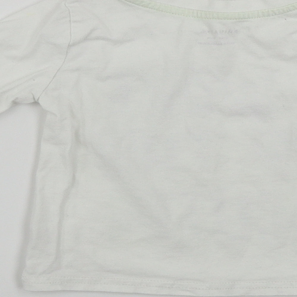Brand and care label for Primark boys’ white basic t-shirt, size 12-18, months