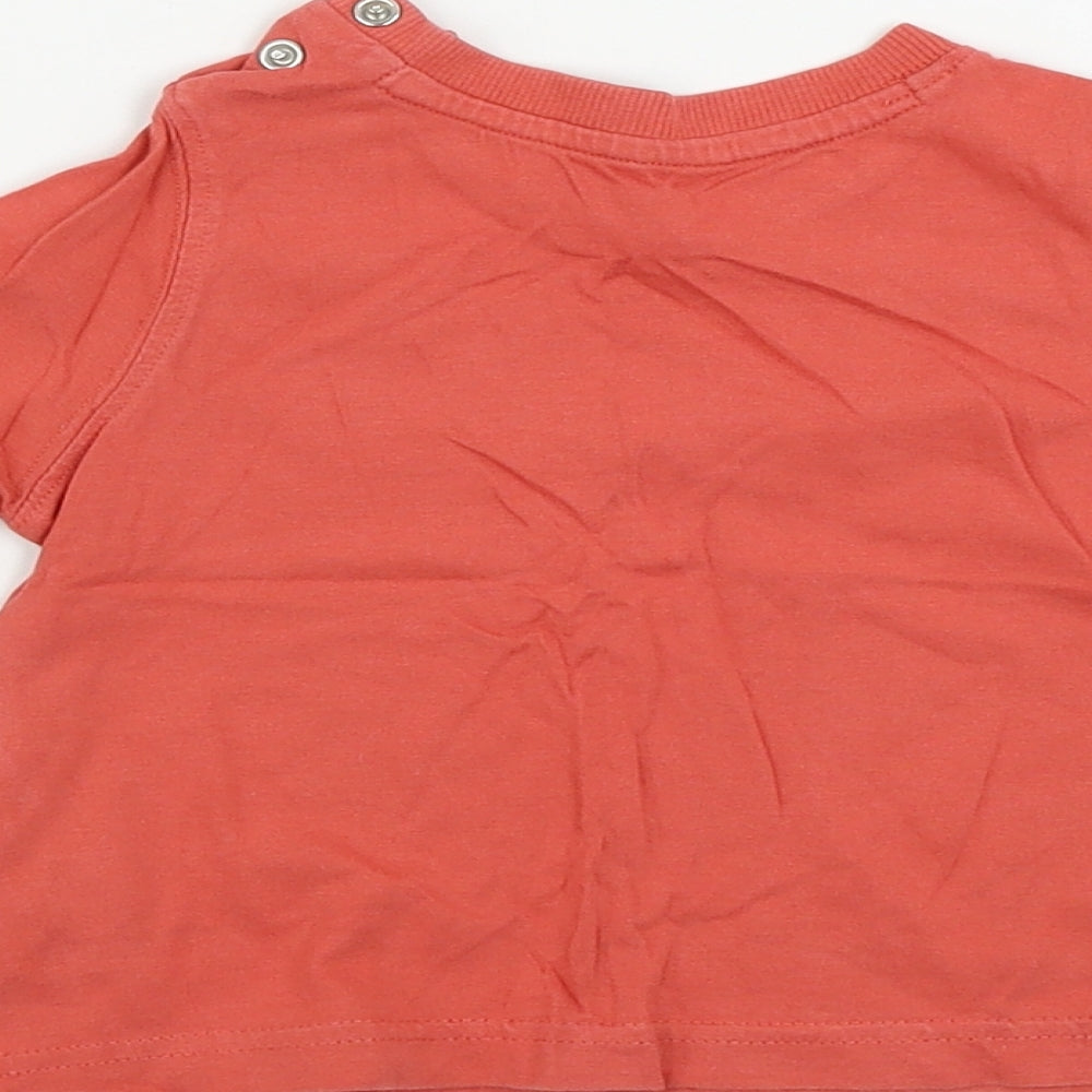 Brand and care label for Mothercare boys’ red basic t-shirt, size 6-9, months