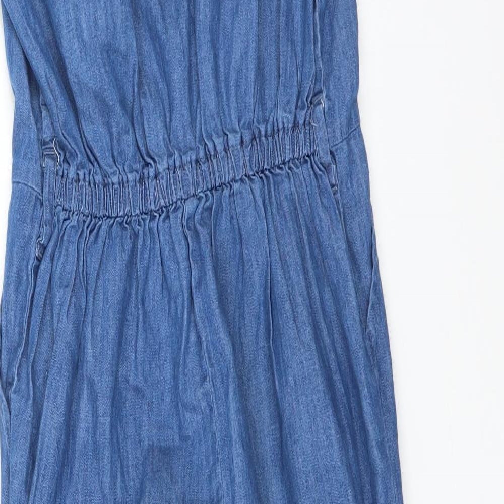 Brand and care label for I Love Girlswear girls’ blue jumpsuit one-piece, size 10, years