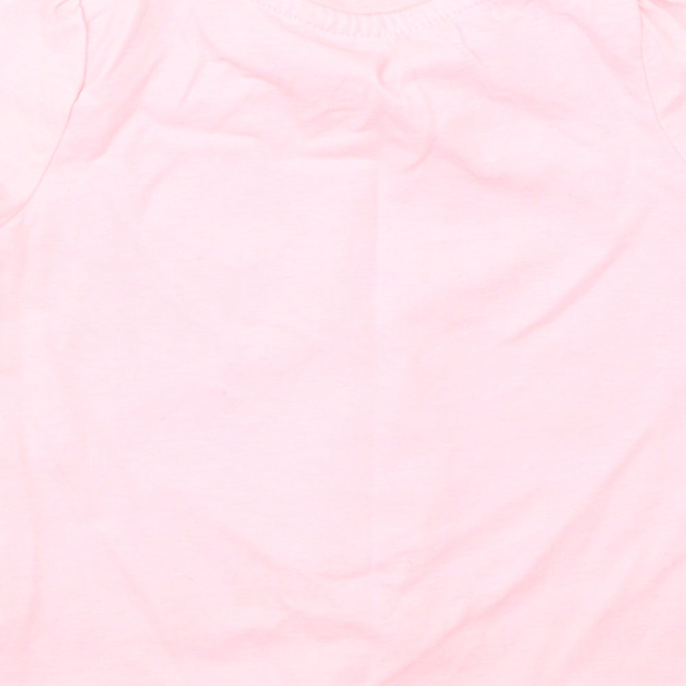 Brand and care label for So Cute girls’ pink basic t-shirt, size 12-18, months