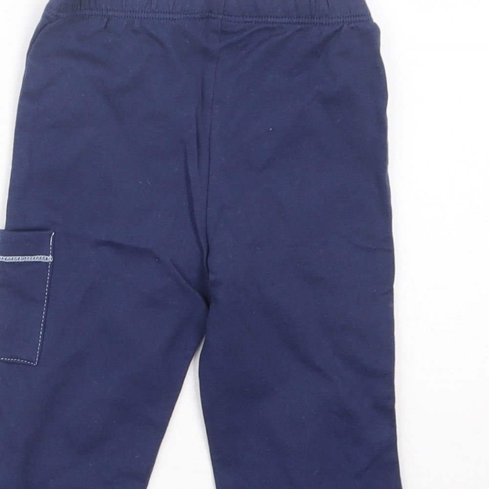 Brand and care label for Preworn boys’ blue capri trousers, size 9, months