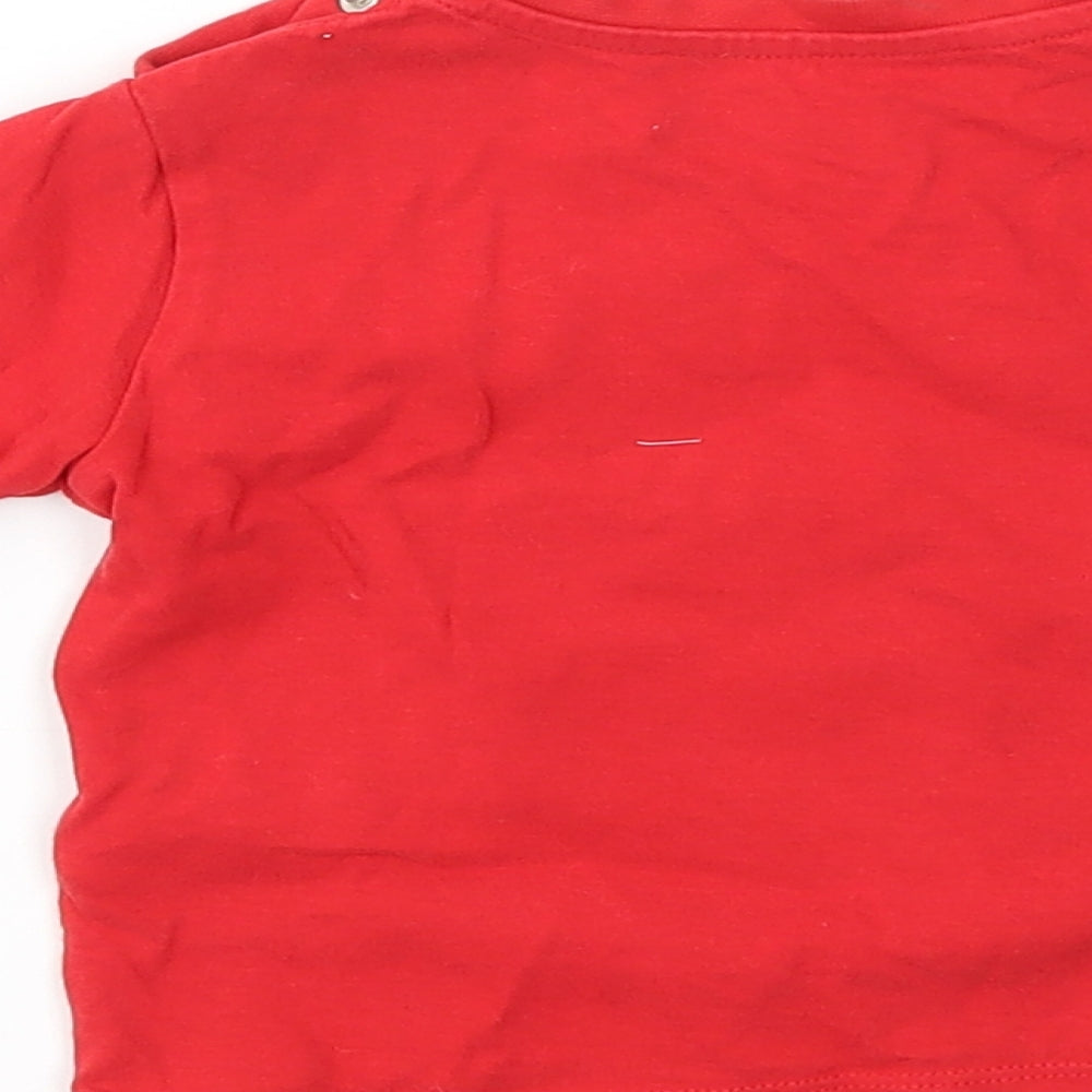 Brand and care label for Marks & Spencer boys’ red animal print basic t-shirt, size 6-9, months