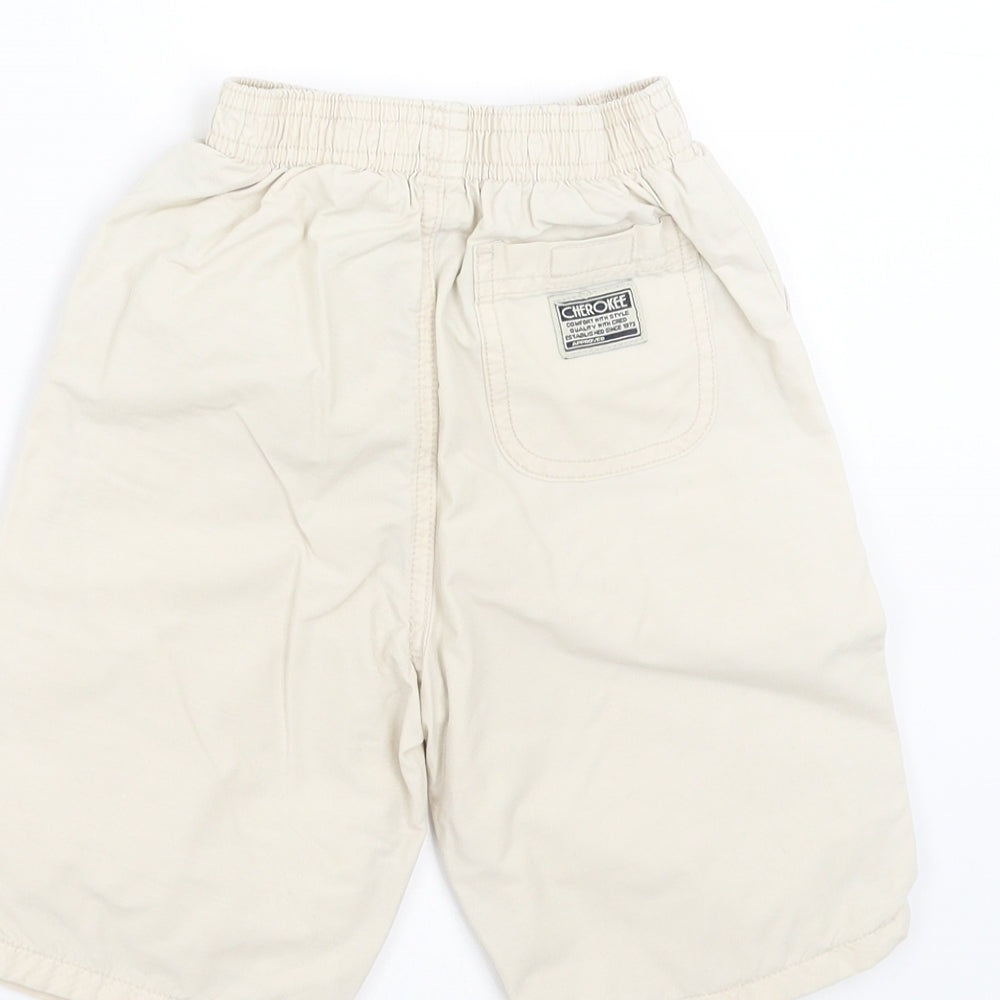 Brand and care label for Cherokee boys’ beige trousers, size 12-18, months - shorts