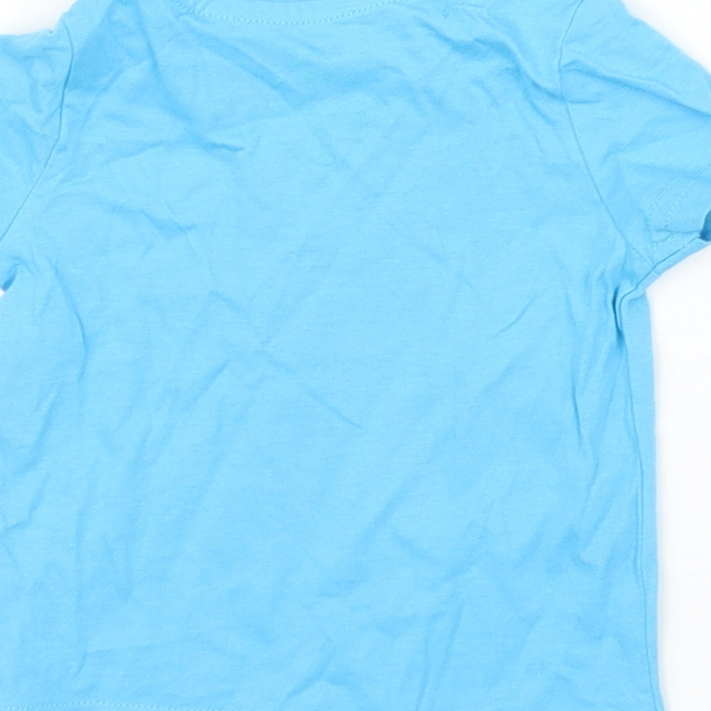 Brand and care label for Mothercare boys’ blue basic t-shirt, size 3-6, months