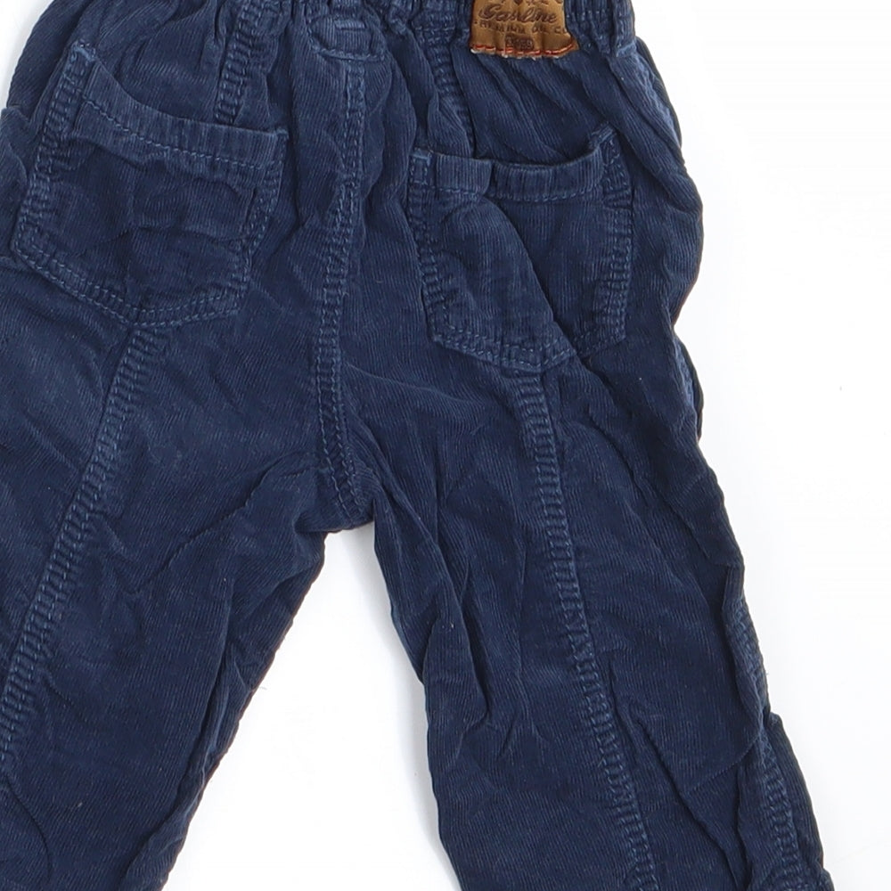 Brand and care label for mamas & papas boys’ blue cargo trousers, size 6-9, months - cord fabric