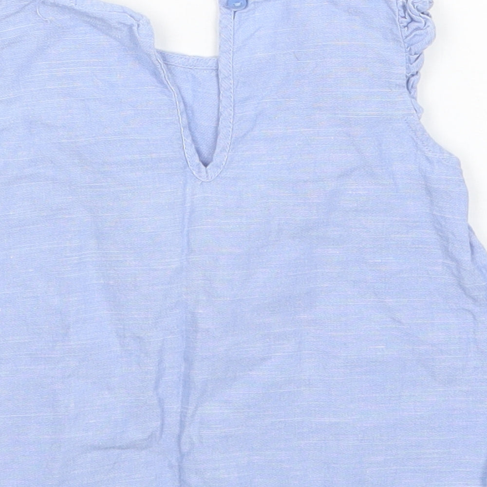 Brand and care label for H&M girls’ blue a-line, size 6-9, months