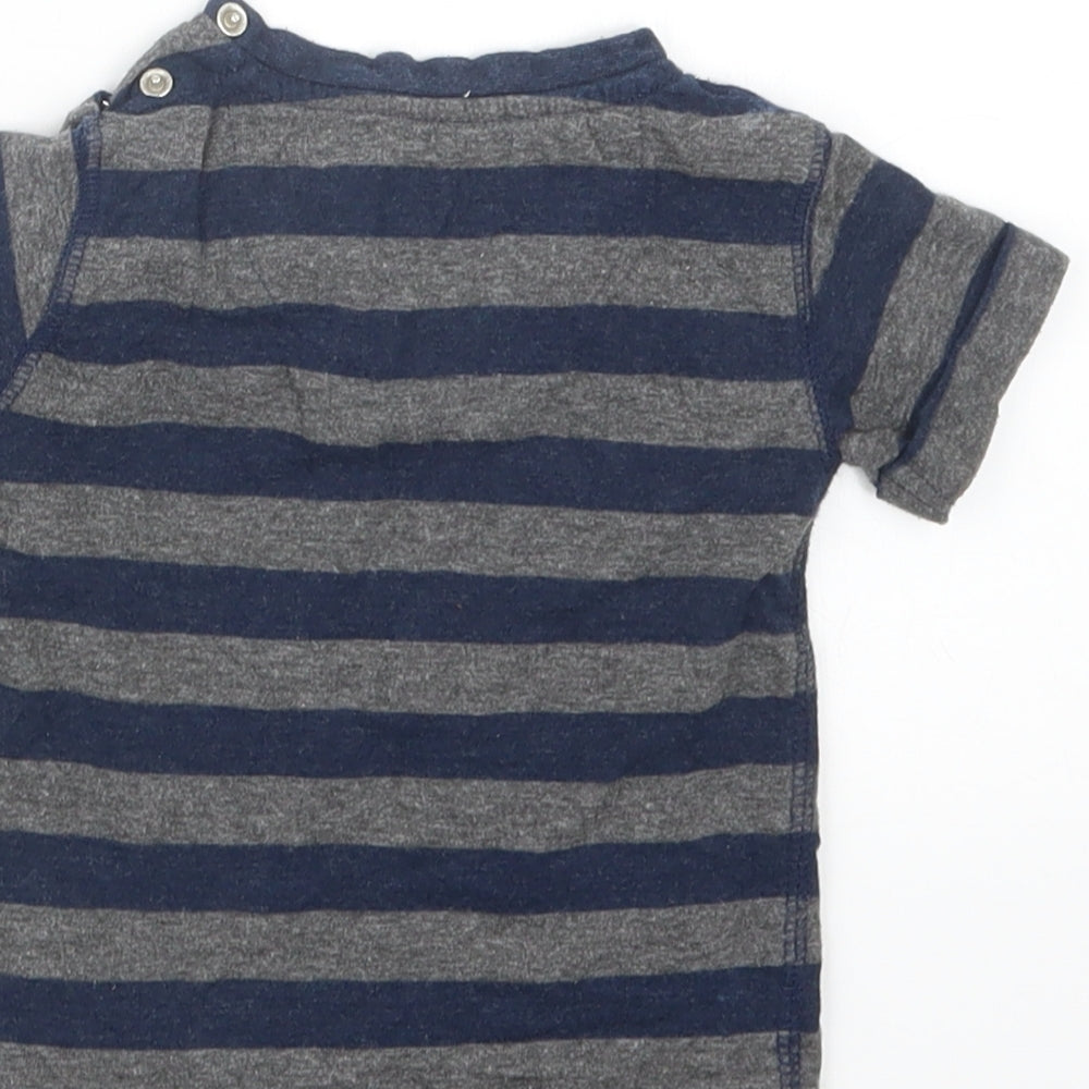 Brand and care label for Early Days boys’ blue striped basic t-shirt, size 9-12, months