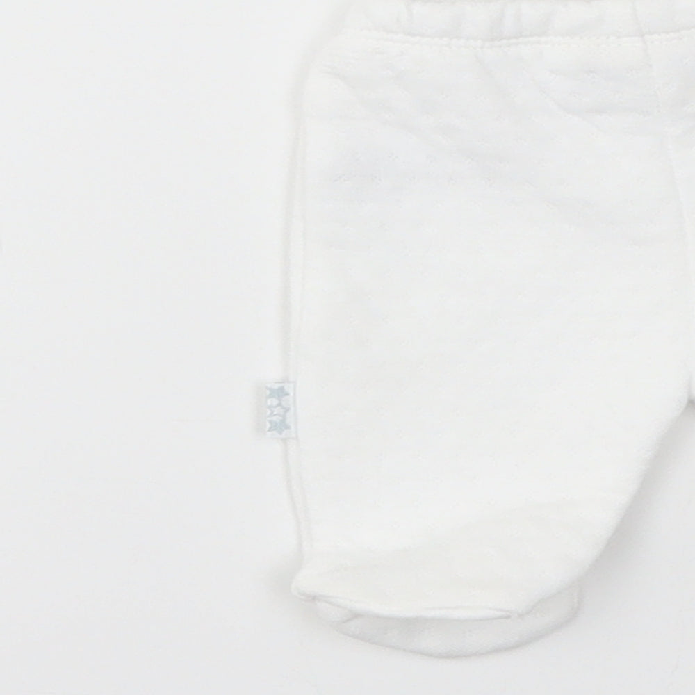 Brand and care label for WATCH ME GROW girls’ white track pants leggings size newborn