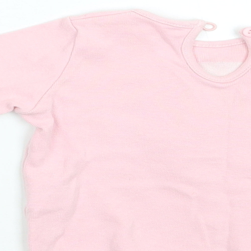 Brand and care label for Matalan girls’ pink basic t-shirt, size 3-6, months
