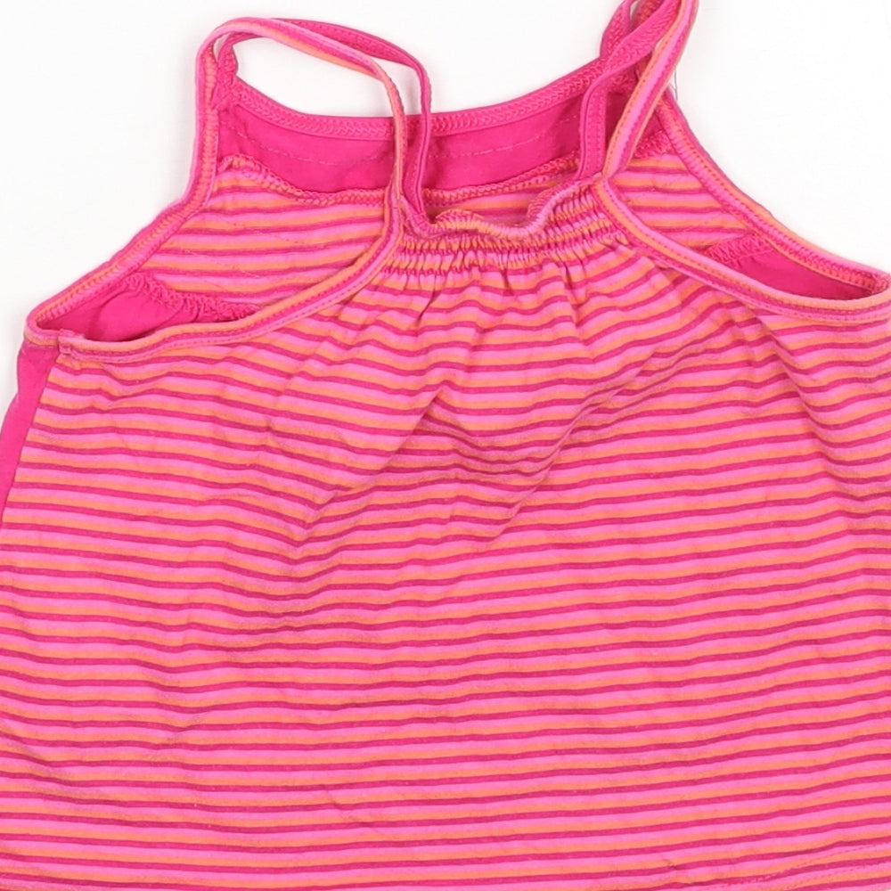 Brand and care label for Matalan girls’ pink floral basic tank, size 9-12, months