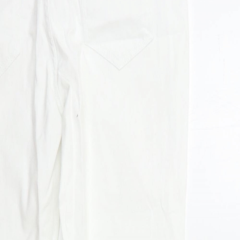 Brand and care label for Dunnes women’s white denim skinny jeans, size UK 12, 27-inch leg