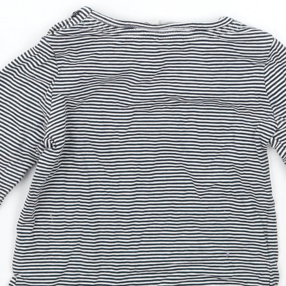 Brand and care label for John Lewis girls’ white striped basic t-shirt, size 9-12, months