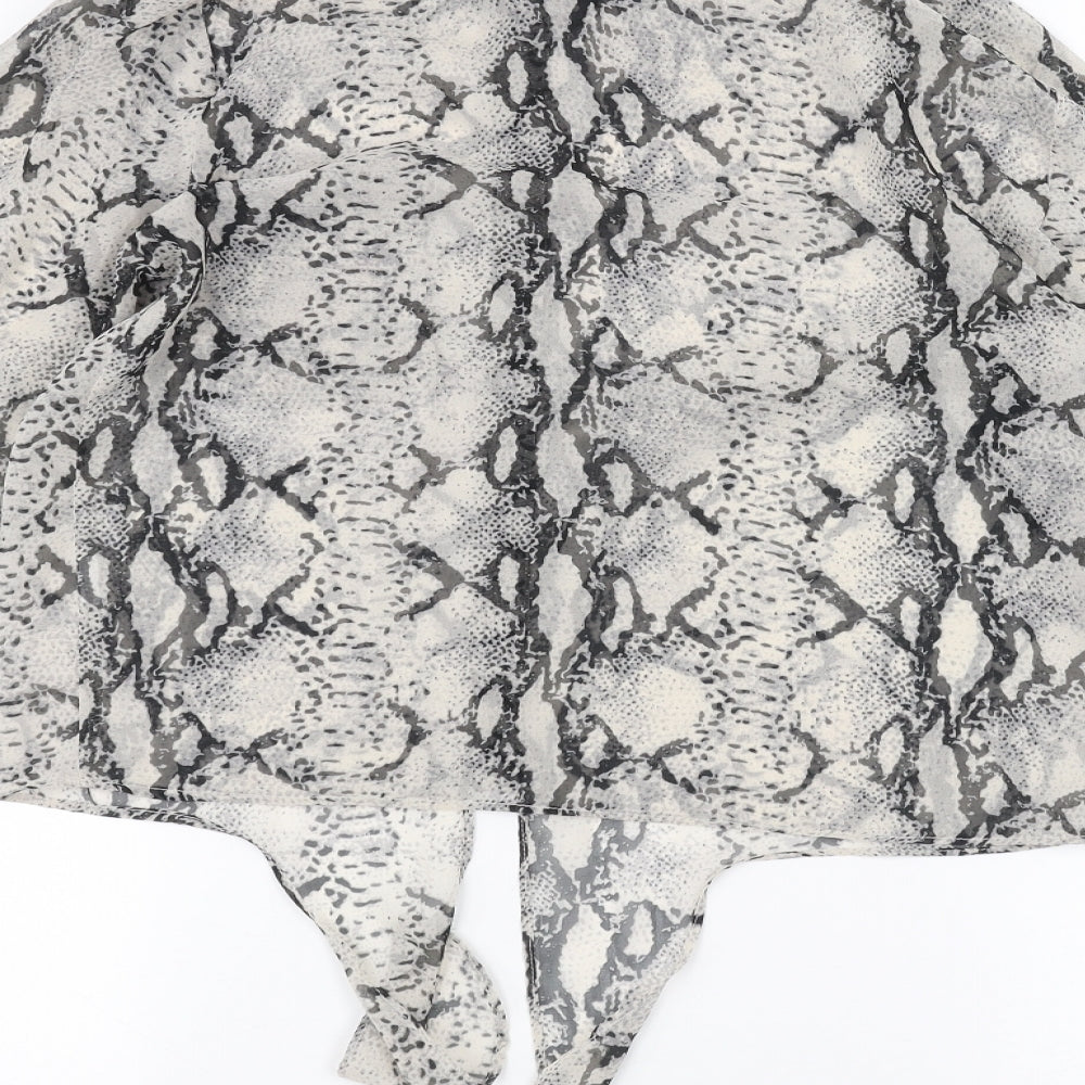 Brand and care label for Miss Selfridge women’s white animal print basic button-up, size UK 8