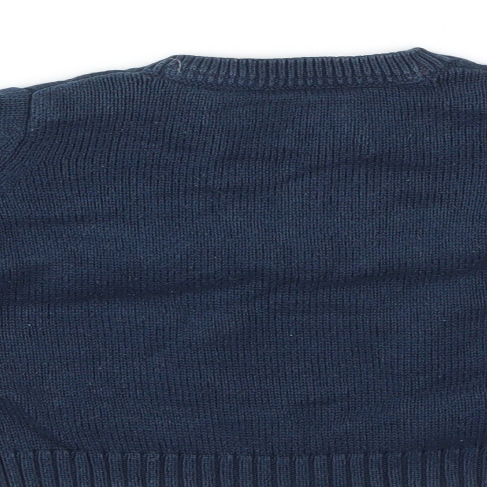 Brand and care label for M boys’ blue jumper, size 3-6, months