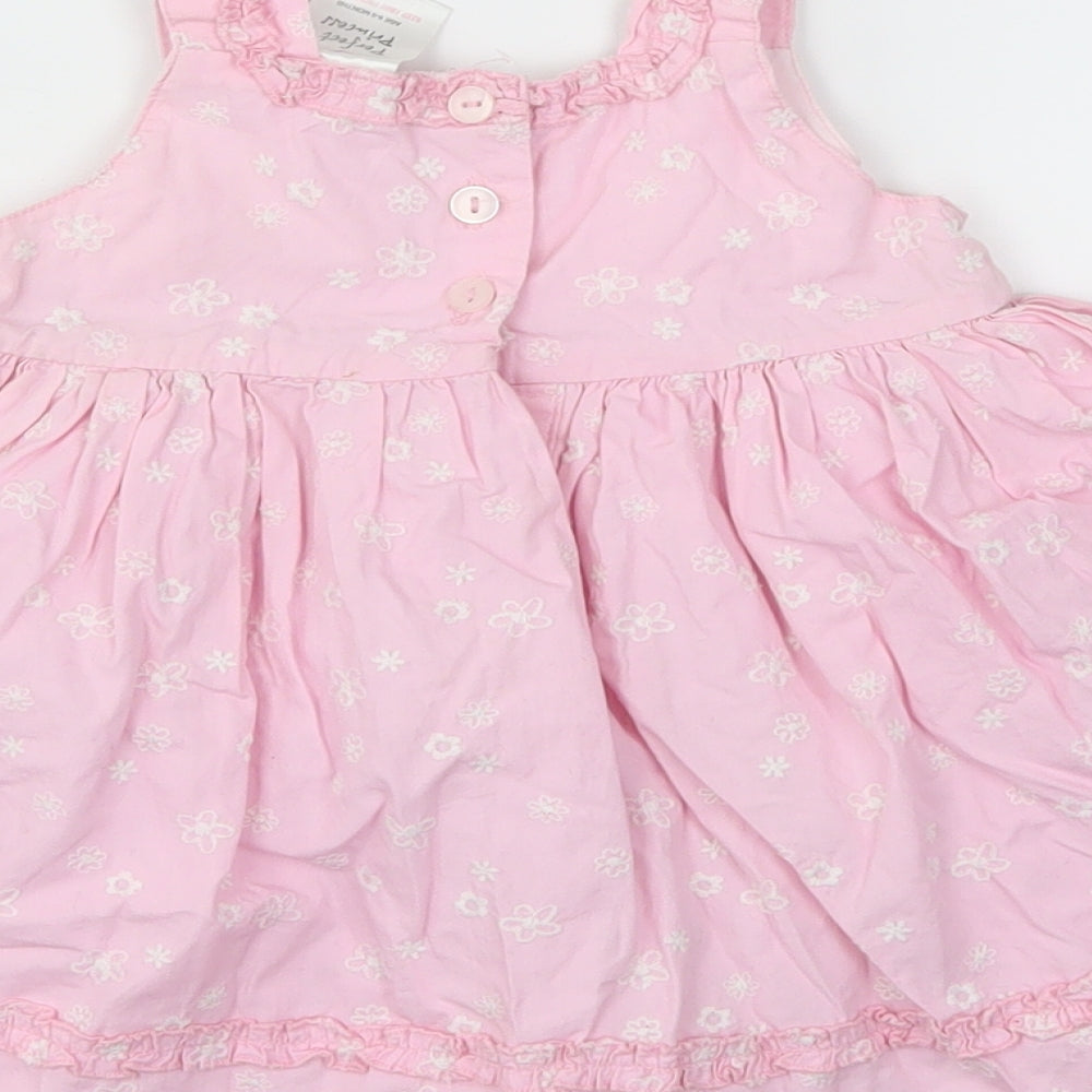Brand and care label for PERFECT PRINCESS girls’ pink floral fit & flare, size 6-9, months