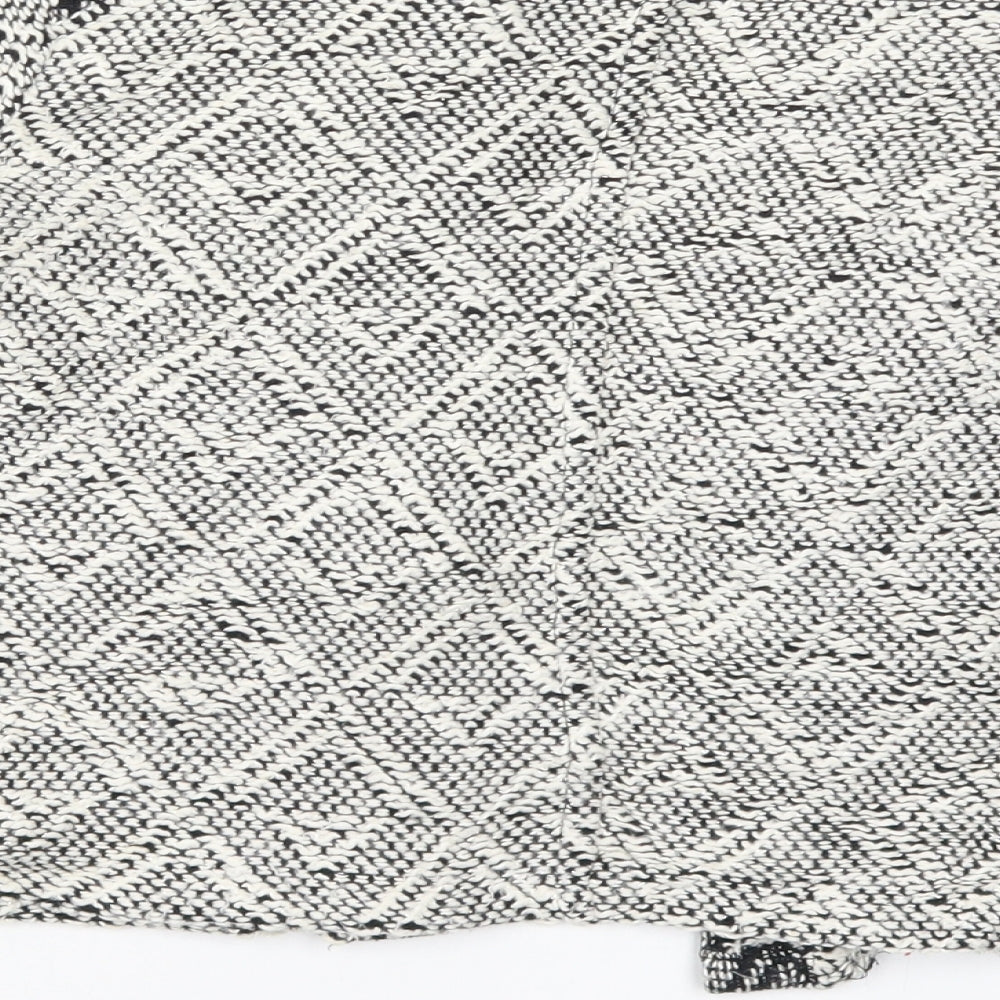 Brand and care label for Miss Selfridge women’s ivory geometric jacket, size UK 12