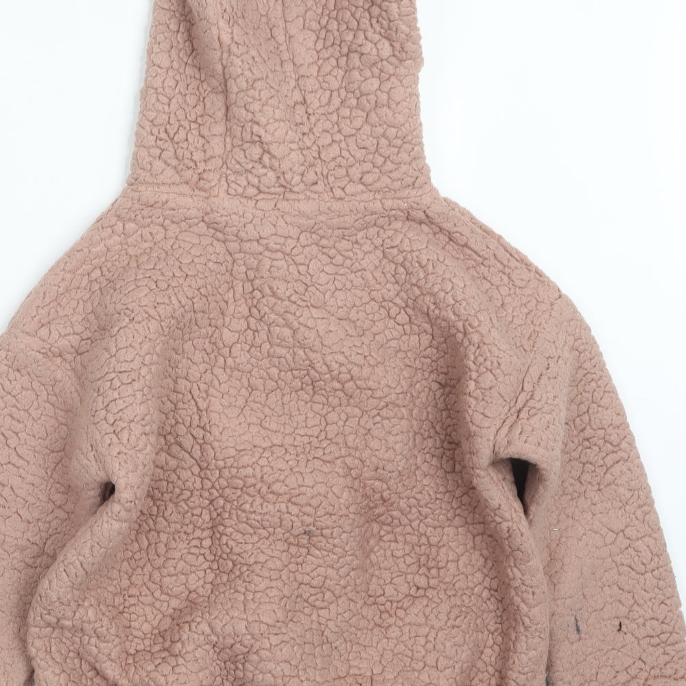 Brand and care label for Next girls’ pink jacket, size 8, years