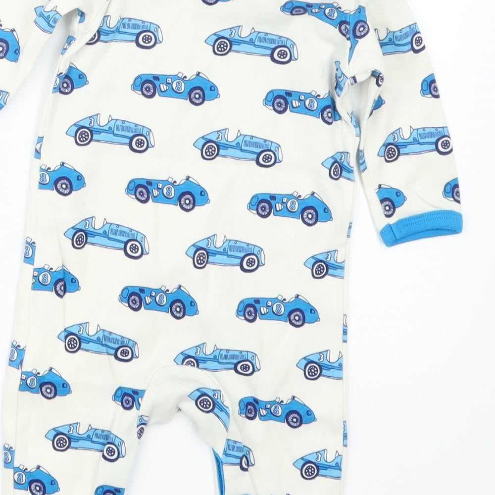 Brand and care label for Mini Club boys’ blue geometric babydoll one piece, size 0-3, months