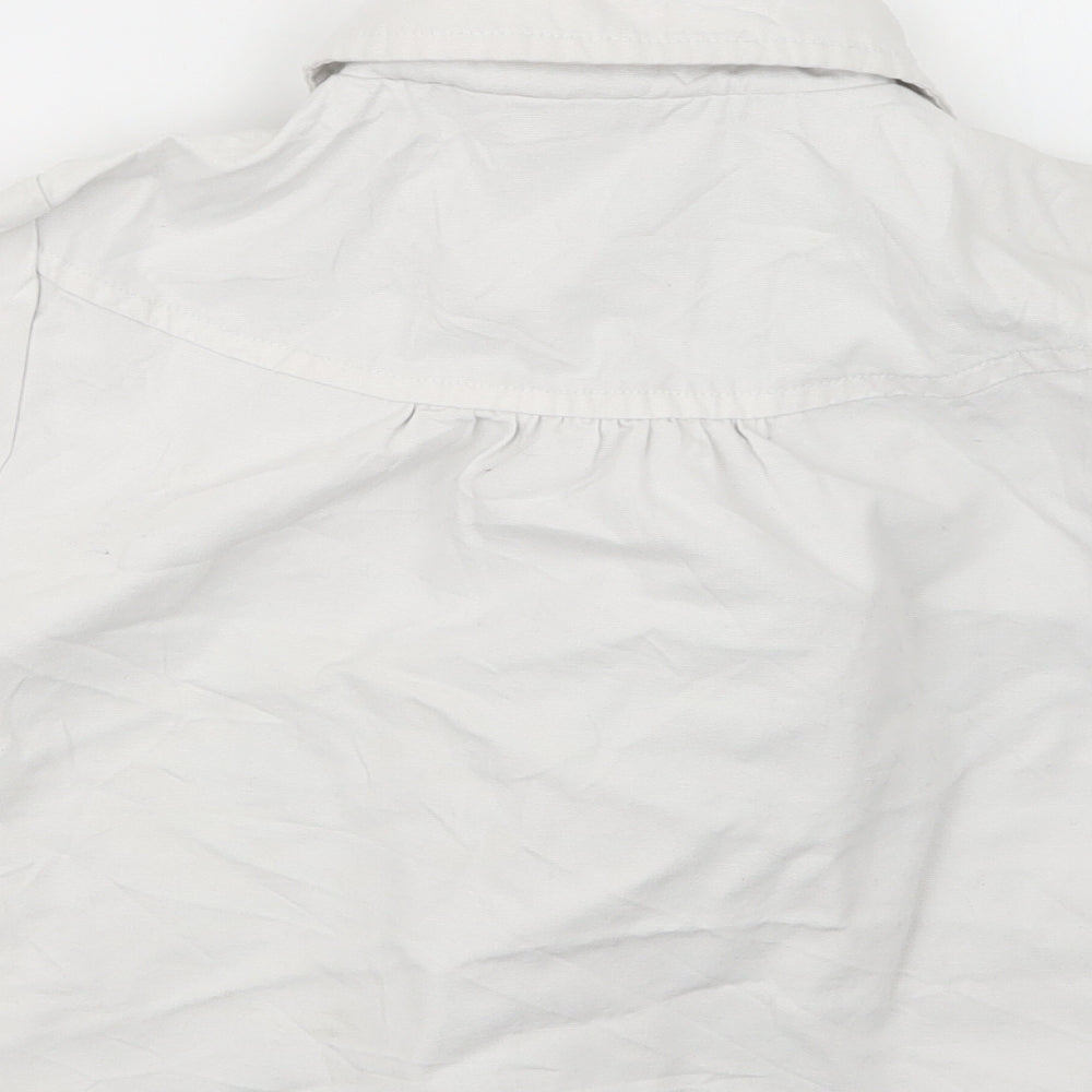 Brand and care label for Tammy girls’ white jacket, size 10-11, years