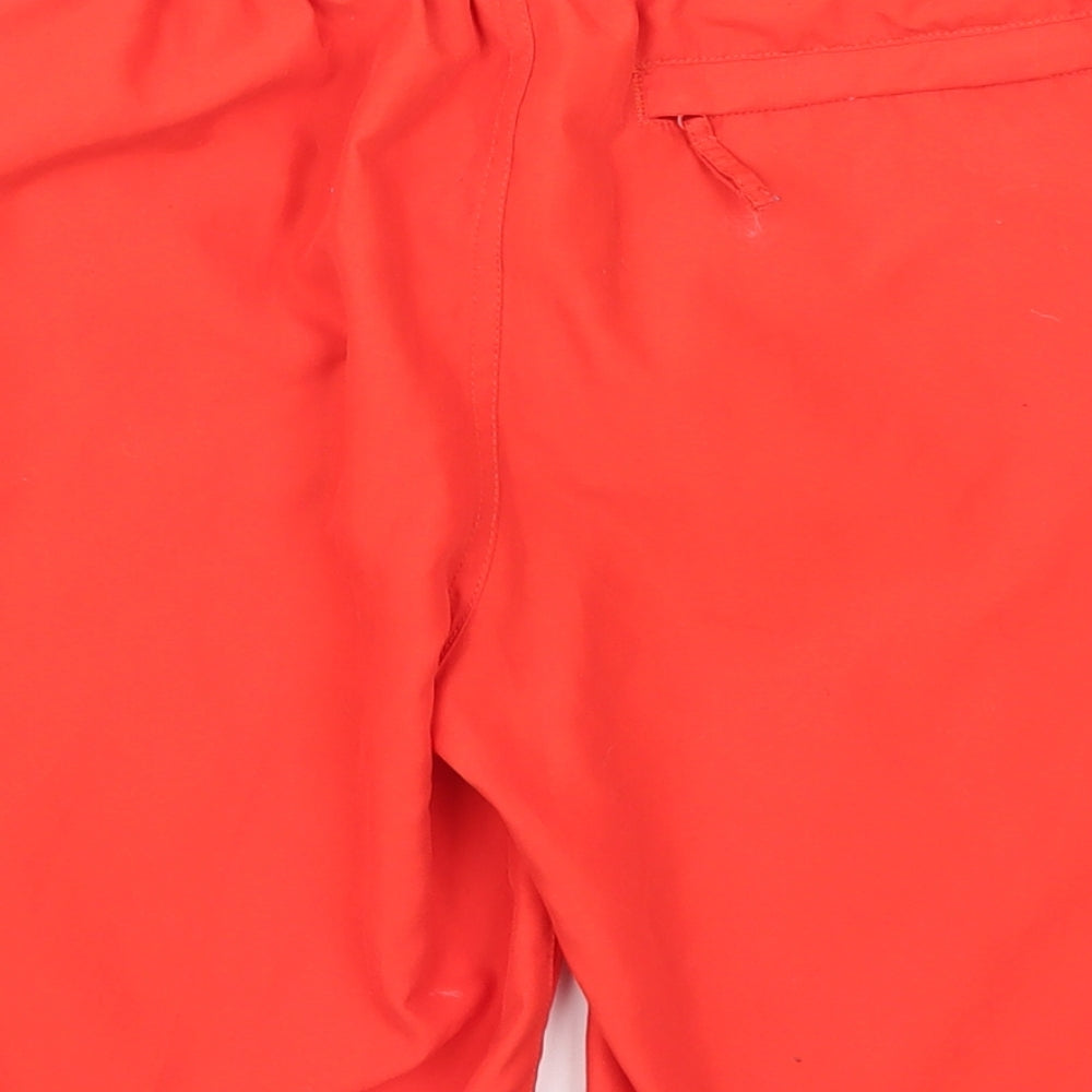 Brand and care label for Speedo men’s red athletic shorts, size 26