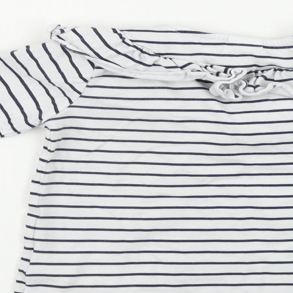 Brand and care label for H&M boys’ white striped basic t-shirt, size 12-18, months