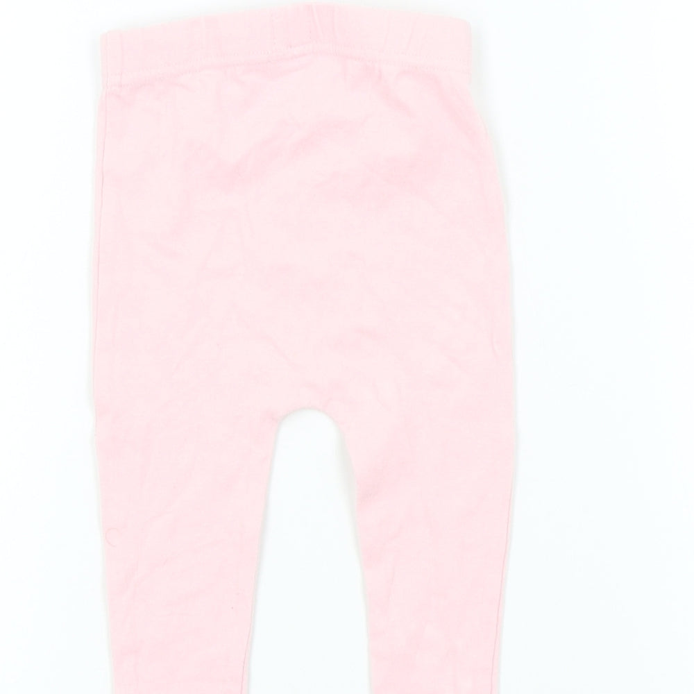 Brand and care label for Studio girls’ pink colourblock jogger leggings, size 9-12, months