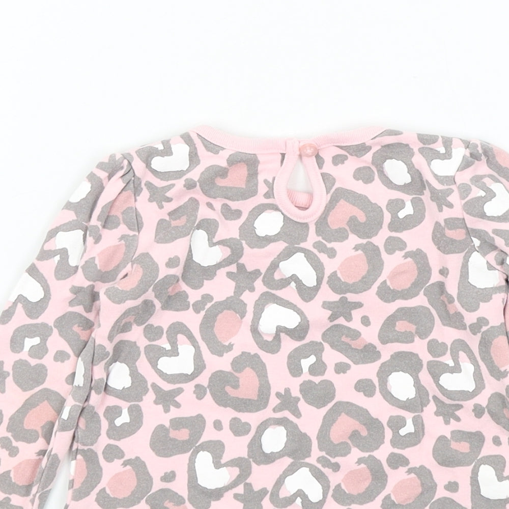 Brand and care label for Studio girls’ pink camouflage jumper, size 9-12, months