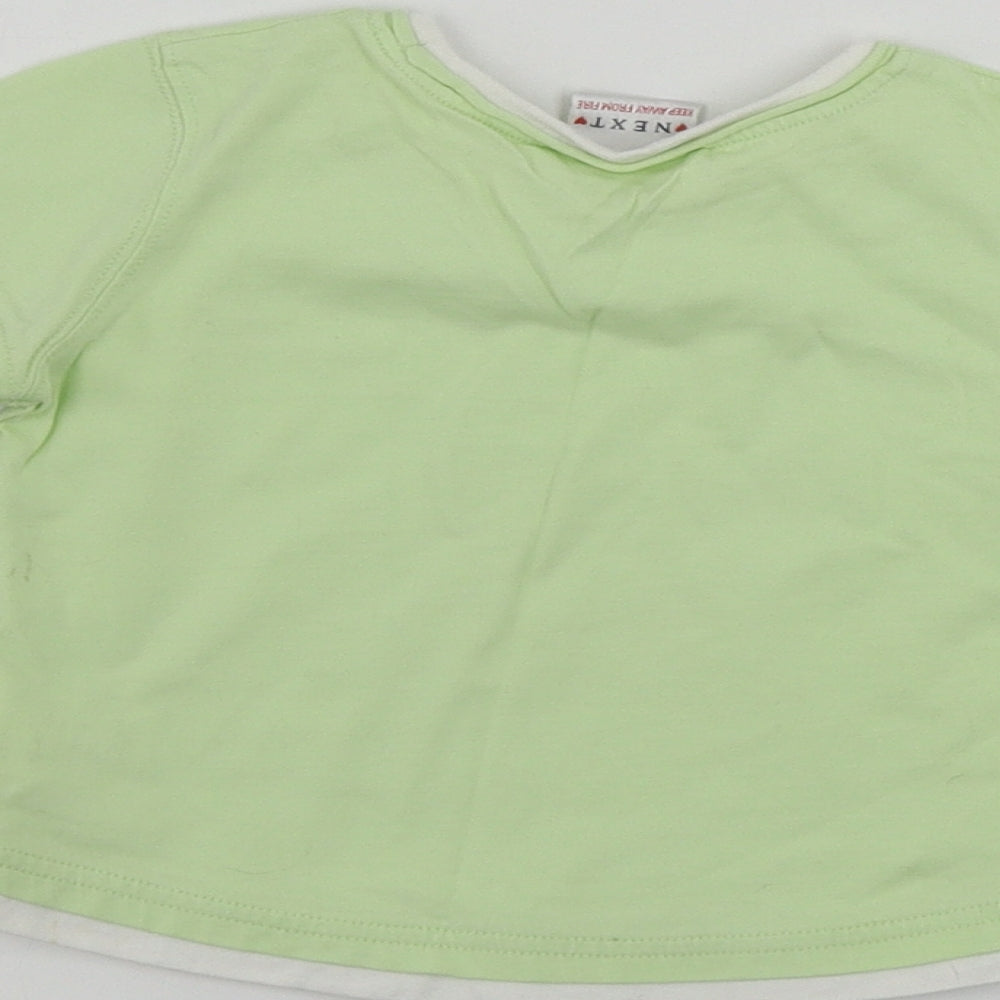 Brand and care label for Next girls’ green basic t-shirt, size 12-18, months