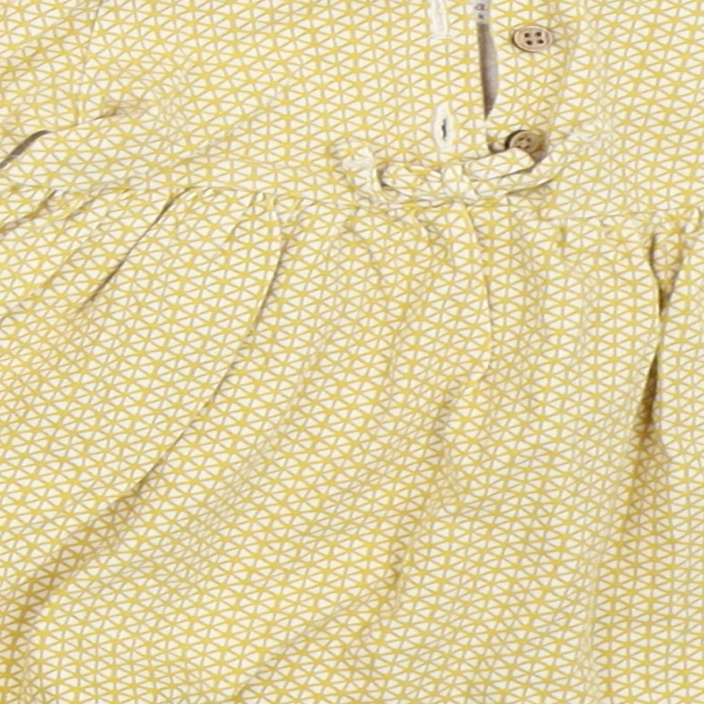Brand and care label for Next girls’ yellow fit & flare, size 3-6, months
