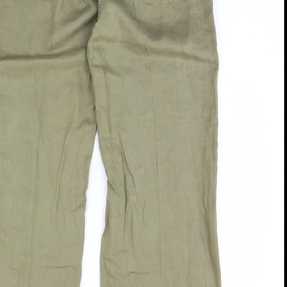 Brand and care label for Mexx women’s green trousers, size UK 34, in, 32-inch leg