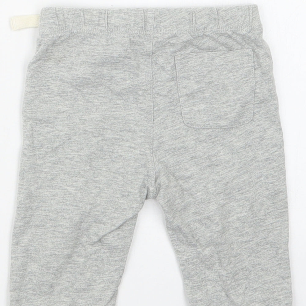 Brand and care label for Gap boys’ grey capri trousers, size 3-6, months