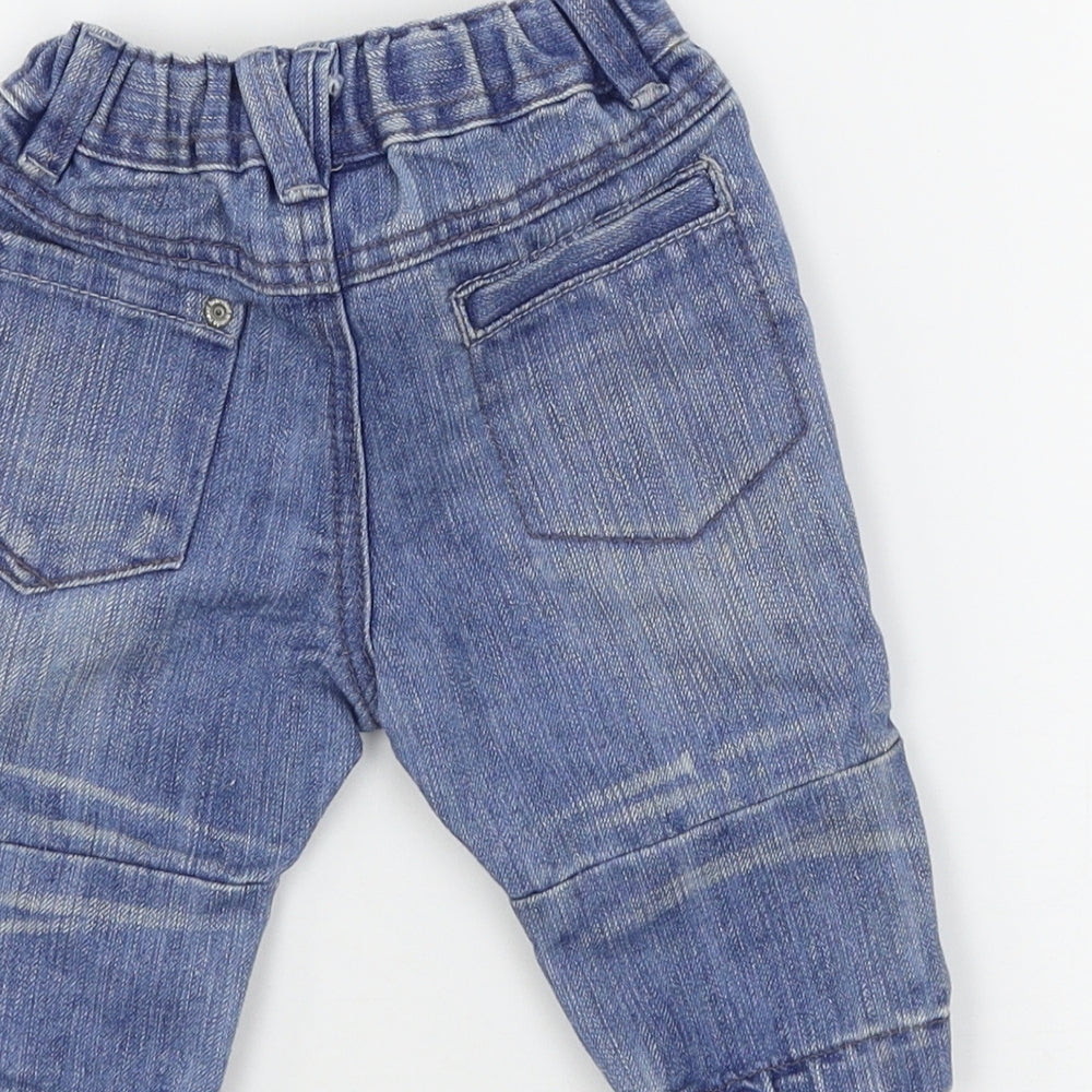 Brand and care label for Next boys’ blue denim cargo jeans, size 3-6, months