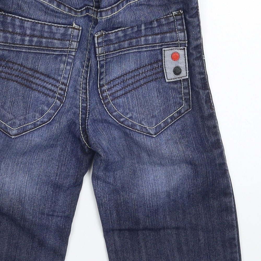 Brand and care label for Cherokee Baby Blue Denim Capri Jeans, size 12-18, Months