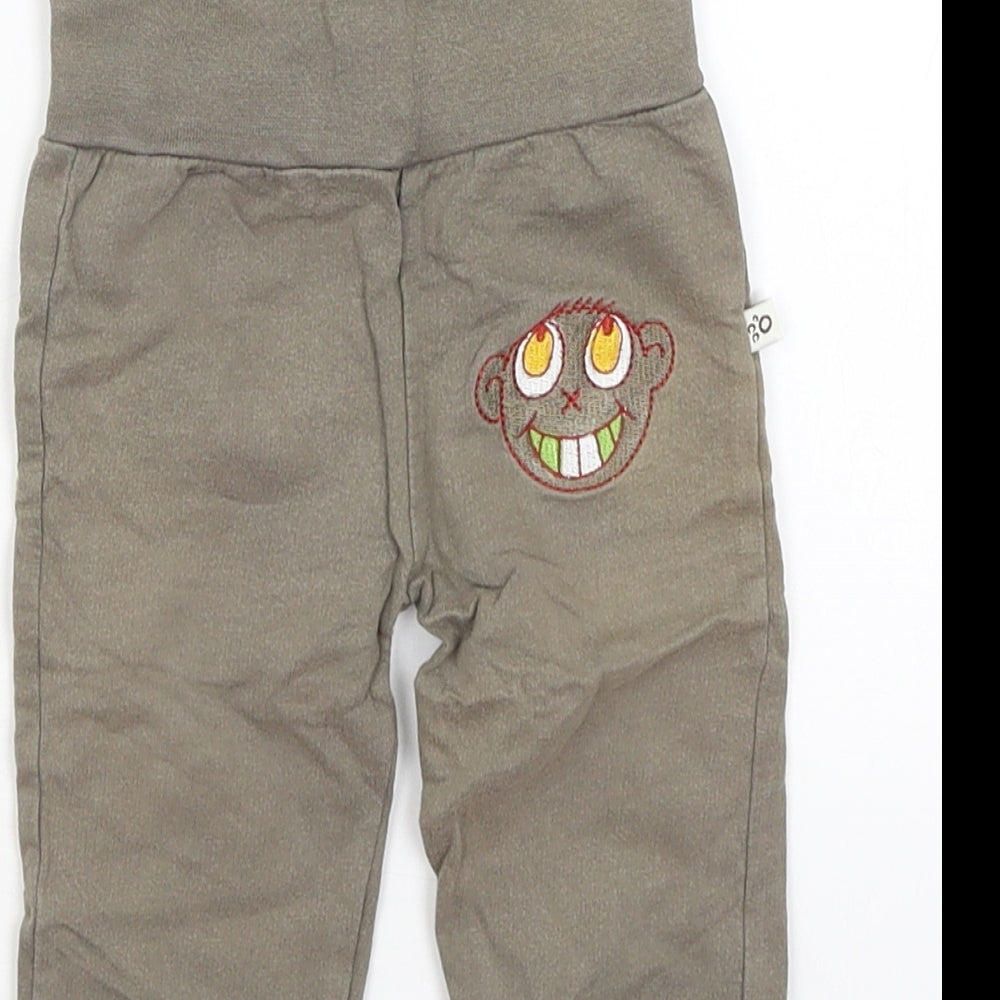 Brand and care label for My Little Bear Baby Green Jogger Trousers, size 3-6, Months