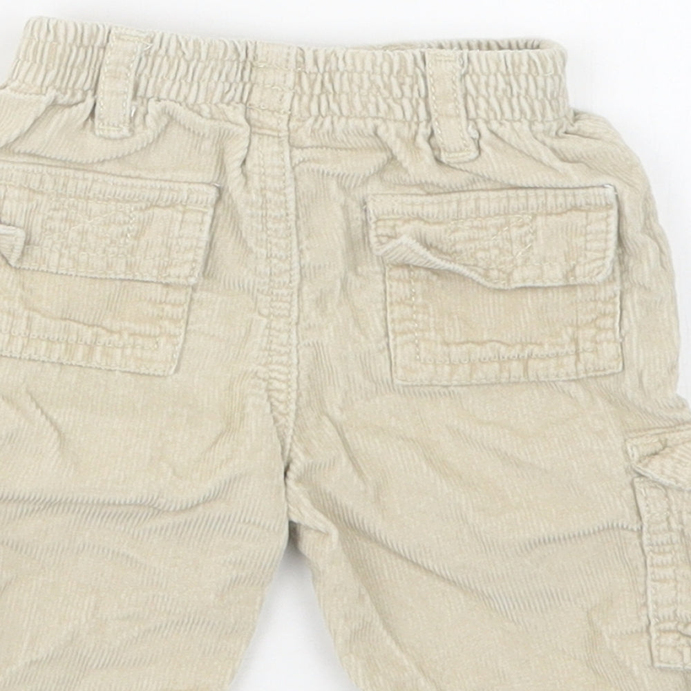 Brand and care label for Adams Kids boys’ beige cargo trousers, size 3-6, months