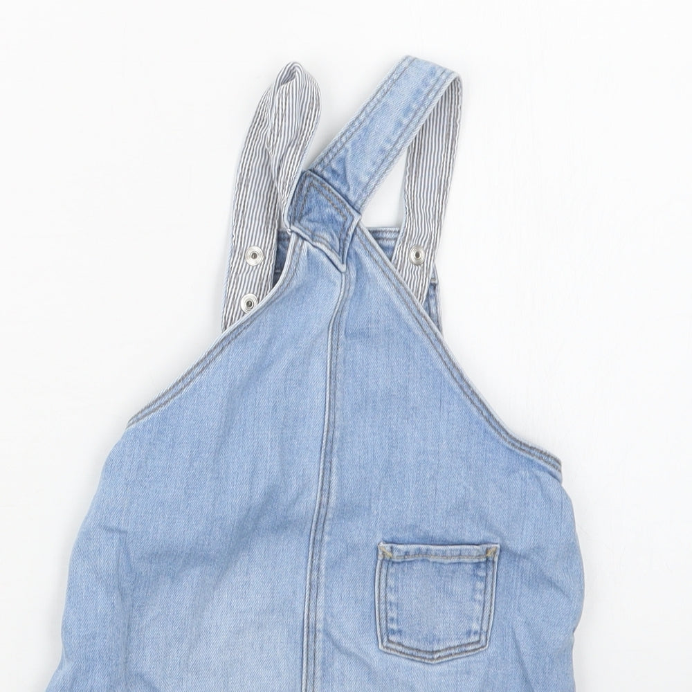 Brand and care label for H&M girls’ blue denim pinafore/dungaree dress, size 18, months