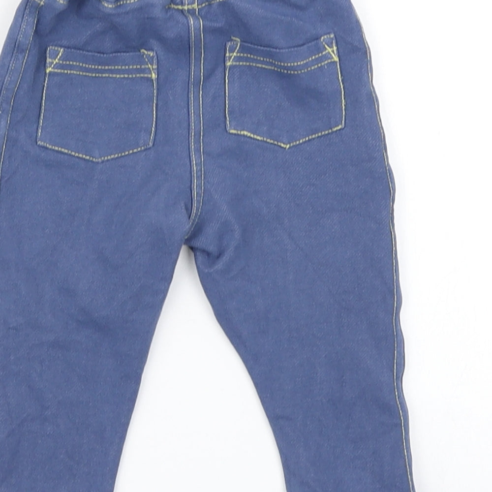 Brand and care label for Dunnes girls’ blue denim jogger jeans, size 6-9, months