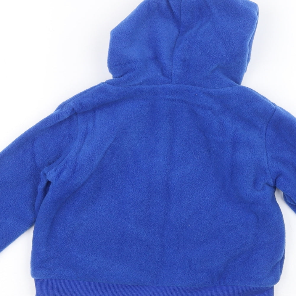 Brand and care label for TOTS Baby Blue Jacket, size 18-24, Months