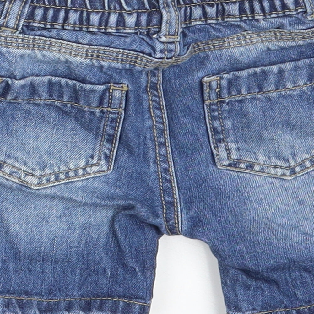 Brand and care label for Manataray Baby Blue Denim sweatpants, size 6-9, Months - Waist 16in; Inside leg 3in
