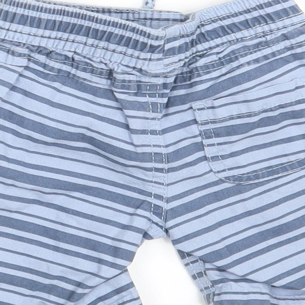 Brand and care label for Primark Baby Blue Striped sweatpants, size 6-9, Months - Waist 16in; Inside leg 3in