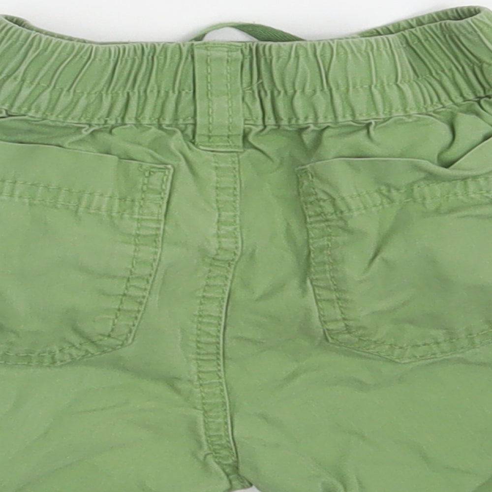 Brand and care label for Next Baby Green sweatpants, size 9-12, Months - Waist 16in; Inside leg 3in