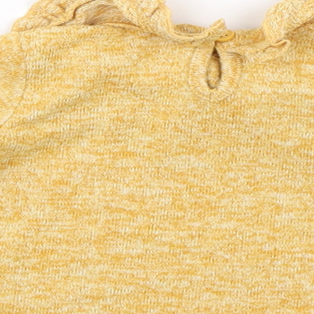 Brand and care label for Matalan girls’ yellow basic t-shirt size newborn