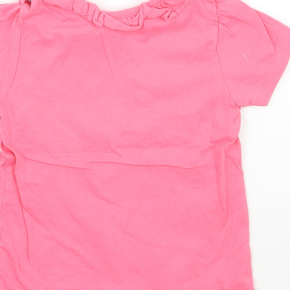 Brand and care label for Nutmeg girls’ pink basic t-shirt, size 12, months