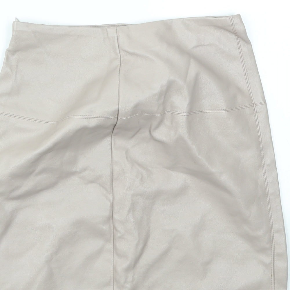 Brand and care label for Missguided women’s purple a-line skirt, size UK 4