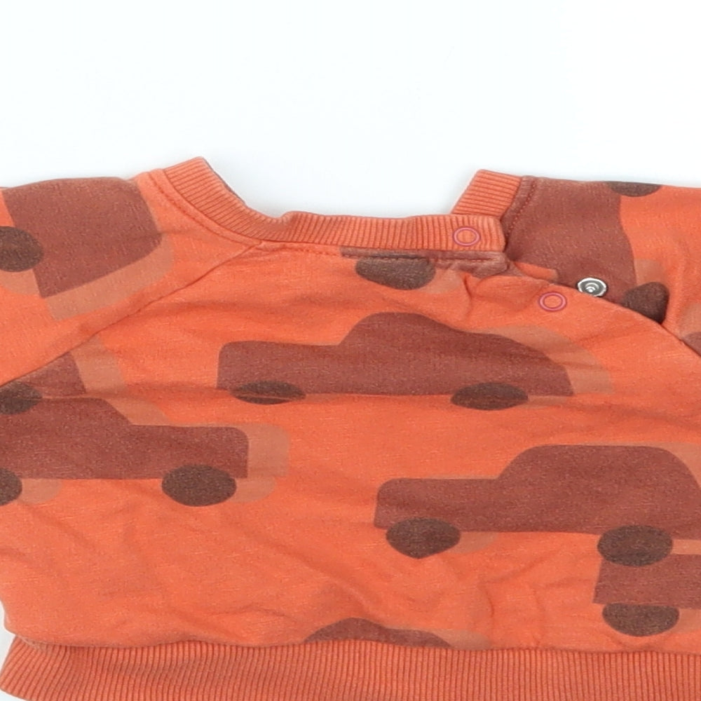 Brand and care label for Next boys’ orange geometric jumper, size 0-3, months