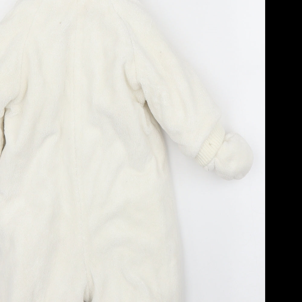 Brand and care label for Mothercare boys’ white overcoat snowsuit